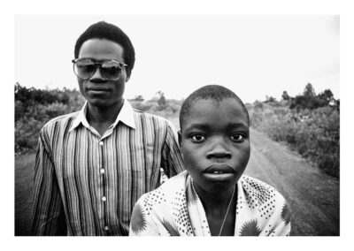 Untitled (Dirt Road with Boys in Sunglasses)